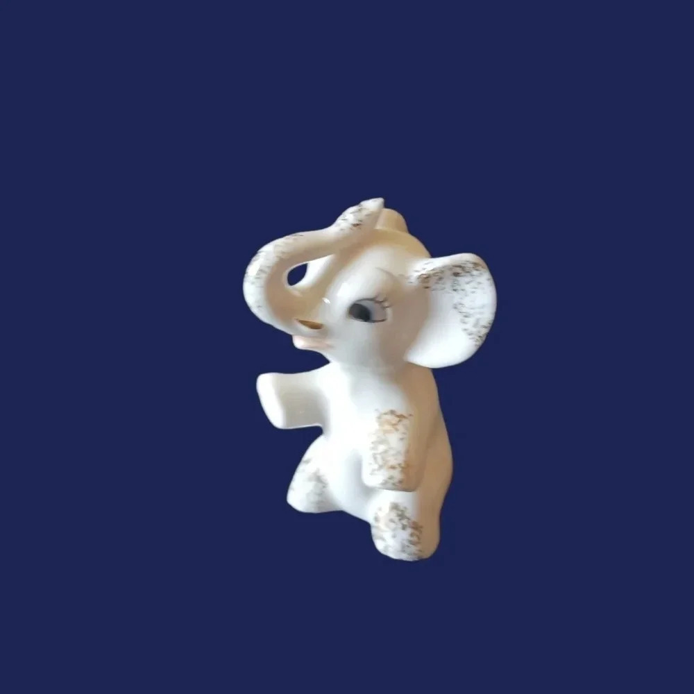 -Vtg porcelain elephant figurine